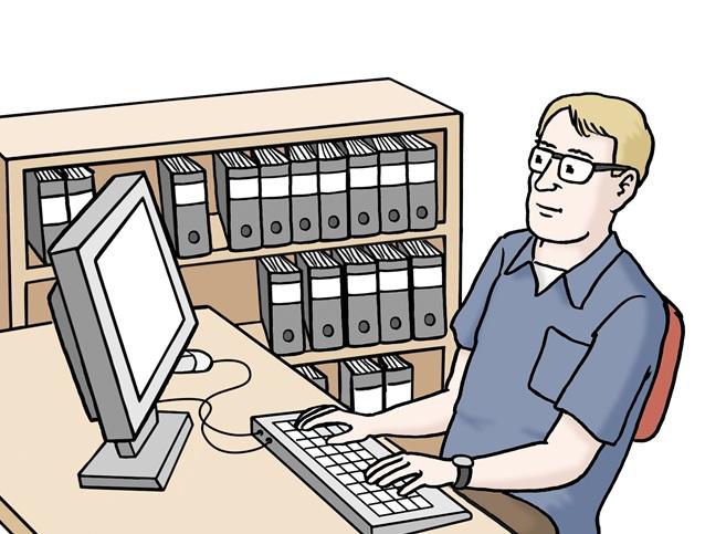 mann am schreibtisch mit computer